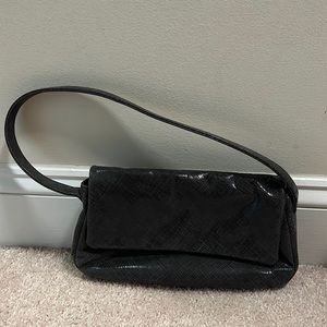 Small shoulder bag. Never been used.